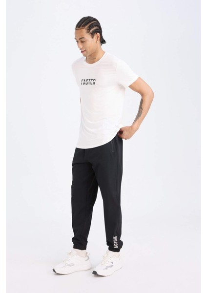 Fit Dokuma Esnek Multifonksiyonel Sporcu Jogger Eşofman Altı Slim Fit Dar Kesim Çift Cepli C1212AX25SP