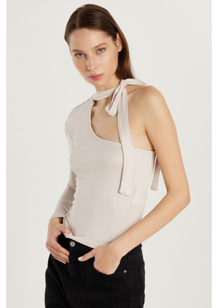 Kadın Standart Fit Fitilli Tek Kol Asimetrik Yaka Taş Renk Bluz fırsatları