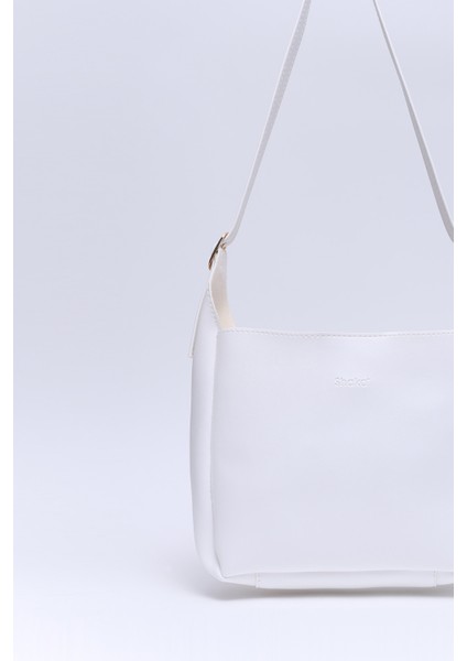 Beyaz SHK158 Suni Deri Tek Bölmeli Askılı Çıtçıtlı Çapraz Kol ve Omuz Çantası indirimleri