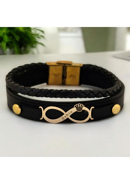 Altın Plakalı 14 Ayar Şahin Yazılı Siyah Derili Sonsuzluk ve Taç Figürlü Hediye BILEKLIK-615ISIM
