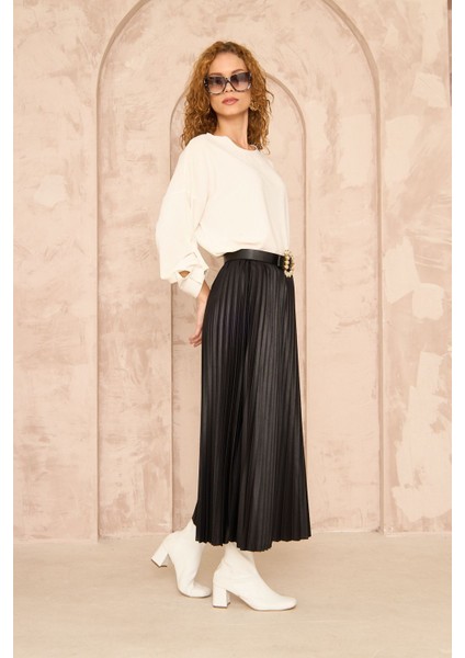 Kadın Siyah Deri Görünümlü Piliseli Uzun Etek indirimleri