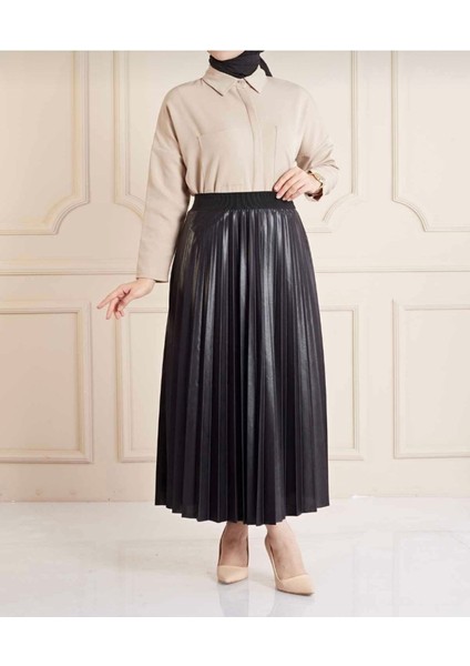 Moda Kadın Siyah Beli Lastikli Deri Görünümlü Piliseli Etek fırsatları