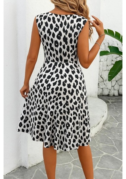 Kadın Sıfır Kollu Önden Çapraz Detaylı Leopar Desenli Süprem Elbise fiyatları