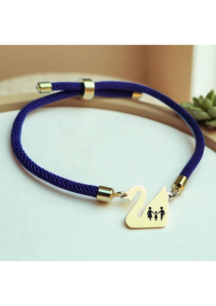 Aile Temalı Lacivert Örgülü Kuğu Kuşu Figürlü 14 Ayar Altın Plakalı Hediye fiyatları