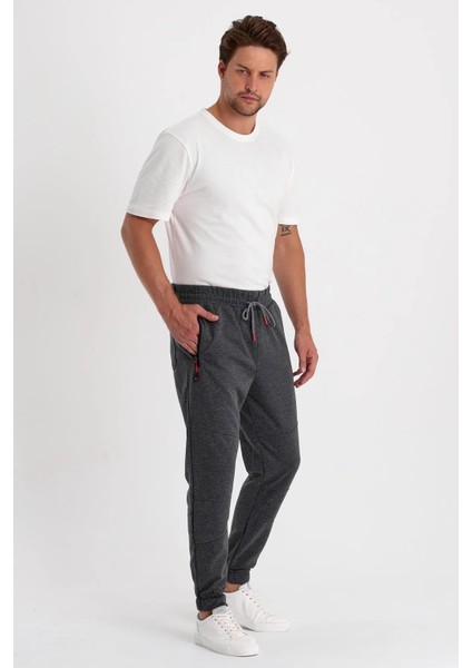 Erkek Paça Kendinden Kıvırma Lastikli Dizi Parçalı Eşofman Altı modelleri