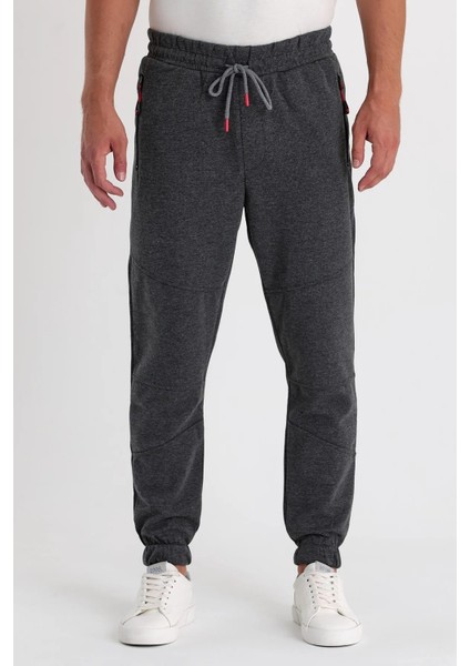 Erkek Paça Kendinden Kıvırma Lastikli Dizi Parçalı Eşofman Altı indirimleri