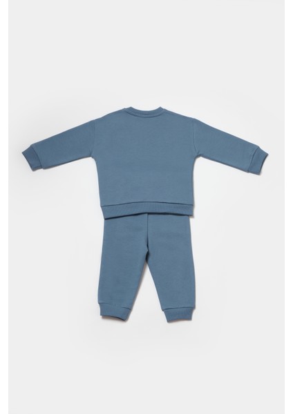 Erkek Bebek Pamuklu Mavi Puzzle Desenli Eşofman Takımı - Uzun Kollu Sweatshirt ve Cep Detaylı Pantolon fiyatları