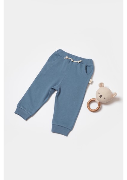 Erkek Bebek Pamuklu Mavi Puzzle Desenli Eşofman Takımı - Uzun Kollu Sweatshirt ve Cep Detaylı Pantolon modelleri