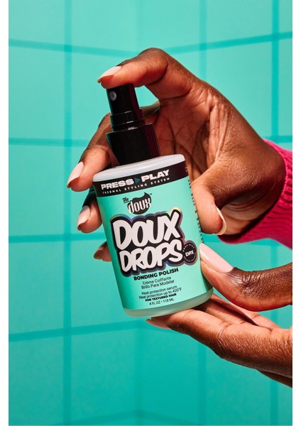 Doux Drops Parlatıcı ve Isı Koruyucu Saç Spreyi 118 ml fırsatları