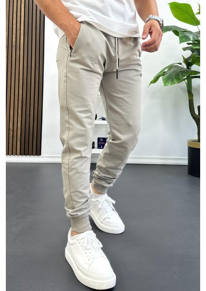 Erkek Regular Fit Dar Paça Lastik Paça Eşofman Altı Bej EDW406