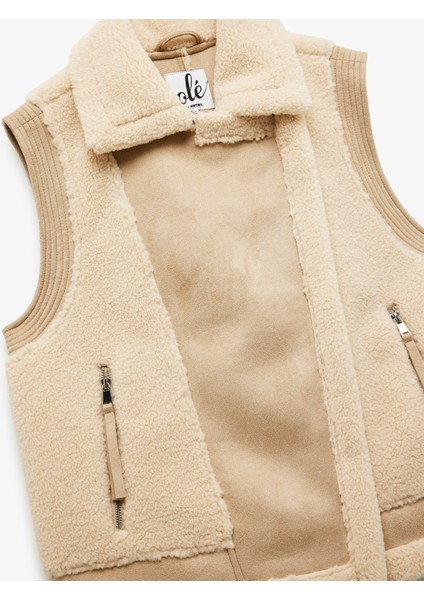 Suni Süet Detaylı Kolsuz Fermuarlı Cepli Peluş Yelek indirimleri