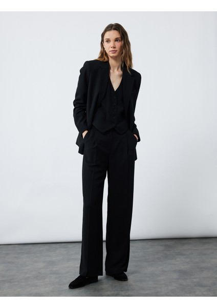 Pile Detaylı Cepli Geniş Paça Uzun Palazzo Pantolon fiyatları