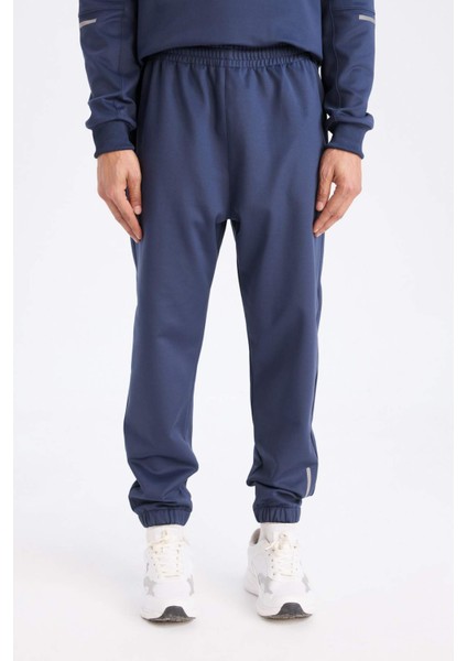 Fit Sporcu Jogger Eşofman Altı Standart Fit Basic Düz Cepli Beli Paçası Lastikli D3742AX24WN fırsatları