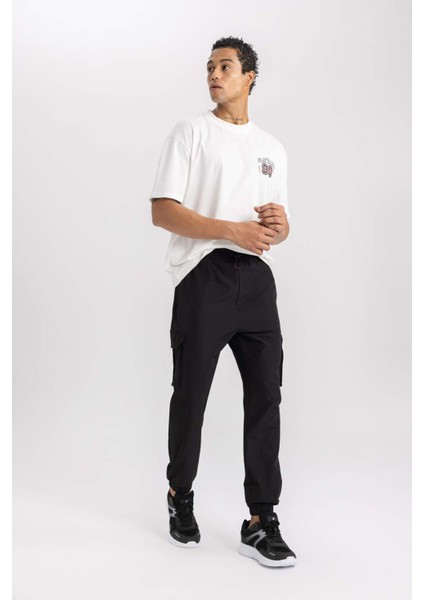 Fit Sporcu Jogger Eşofman Altı Standart Fit Kargo Cepli Dokuma Beli Paçası Lastikli C0043AX24SP fırsatları