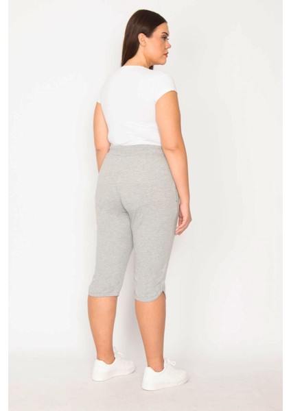 Kadın Gri Beli Lastik ve Kuşgözü Bağcık Detaylı Cepli Pamuklu Kumaş Kapri Pantolon 65N29550 modelleri