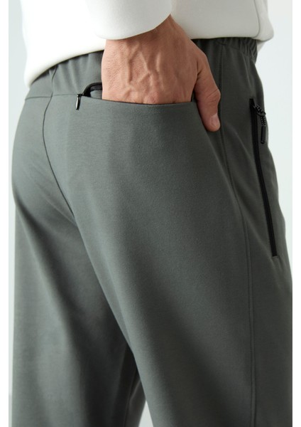 Haki Fermuarlı Üç Cepli Dar Kalıp Klasik Paça Erkek Eşofman Alt - 84671 indirimleri