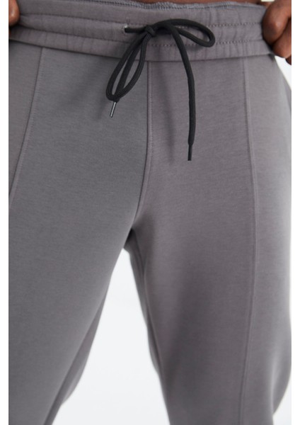 Koyu Gri Bağcıklı Ön Dikiş Detaylı Standart Kalıp Erkek Eşofman Alt - 84994 fırsatları