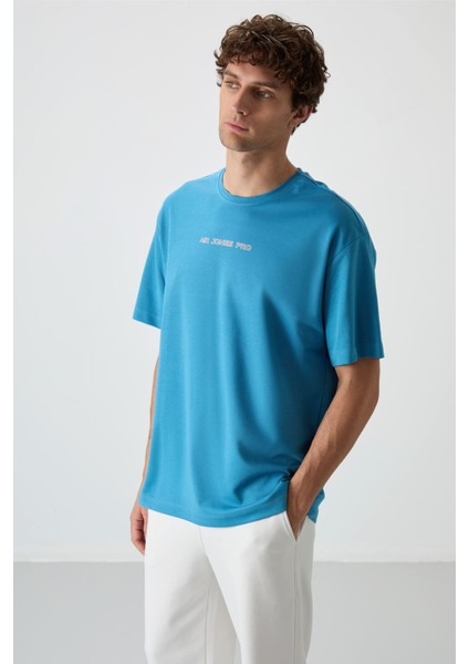 Petrol Mavi Pamuklu Kalın Yüzeyi Dokulu Oversize Fit Baskılı Erkek T-Shirt - 88364 fırsatları