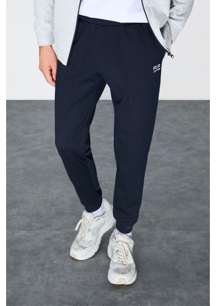 Gri-Lacivert Yüzeyi Dokulu Standart Fit Nakışlı Erkek Eşofman Takım - 85248 modelleri