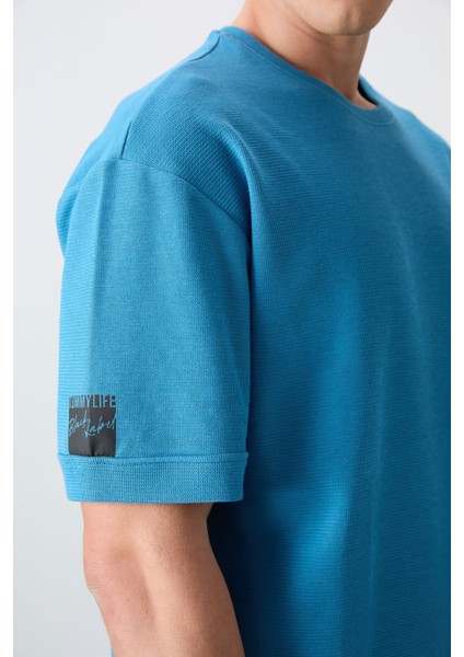 Petrol Mavi Pamuklu Kalın Yüzeyi Dokulu Oversize Fit Basic Erkek T-Shirt - 88339 fırsatları