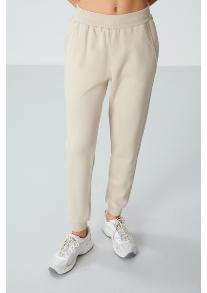 Bej Kompakt Pamuklu Kalın Pürüzsüz Dokulu Standart Fit Kadın Eşofman Altı - 94660 modelleri