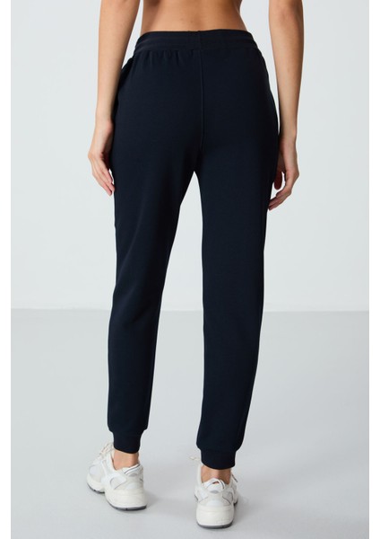 Lacivert Kompakt Pamuklu Kalın Pürüzsüz Dokulu Standart Fit Kadın Eşofman Altı - 94660 indirimleri