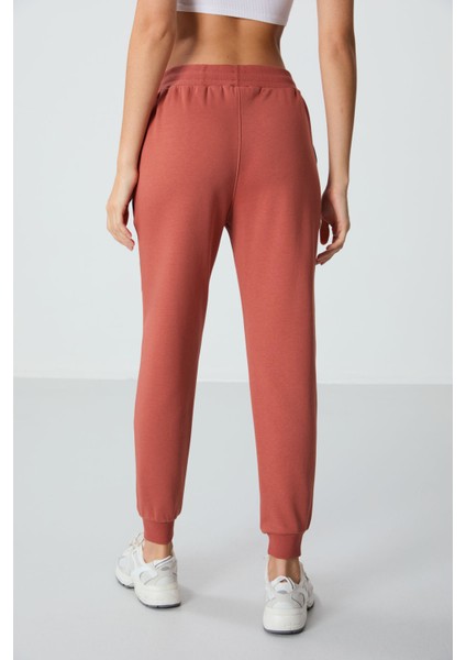 Kiremit Kompakt Pamuklu Kalın Pürüzsüz Dokulu Standart Fit Kadın Eşofman Altı - 94660 indirimleri