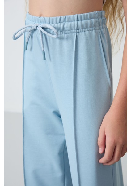 Açık Mavi Cepli Ön Dikiş Detaylı Geniş Paça Kız Çocuk Eşofman Altı -75144 modelleri