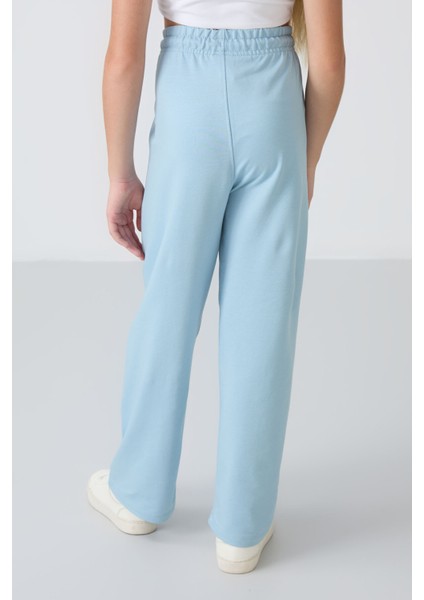 Açık Mavi Cepli Ön Dikiş Detaylı Geniş Paça Kız Çocuk Eşofman Altı -75144 indirimleri