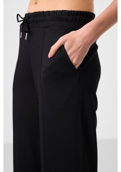 Siyah Yumuşak Dokulu Cepli Ön Dikiş Detaylı Kadın Palazzo Pantolon - 94670 modelleri