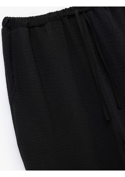 Beli Bağcıklı Regular Fit Havuç Kesim Pantolon modelleri