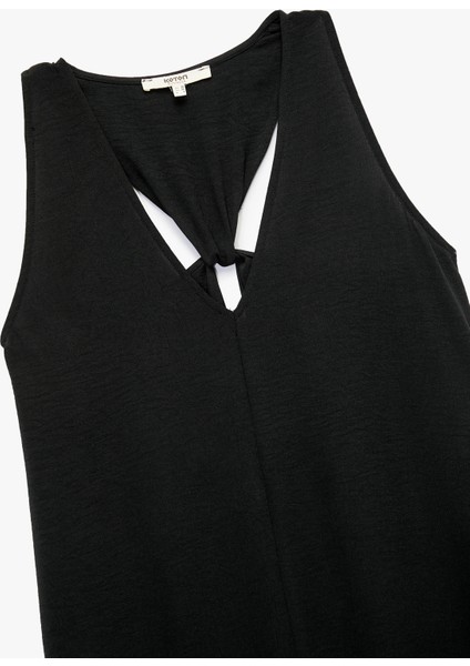 Aerobin Kumaş V Yaka Kolsuz Pencere Detaylı Midi Boy Kloş Elbise indirimleri