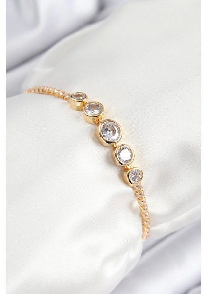 Pirinç Zirkon Taşlı Sıralı Daire Model Gold Renk Asansörlü Kadın Bileklik