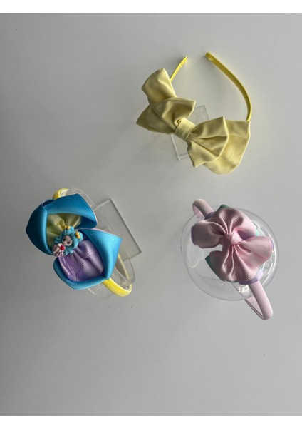 Zarif ve Modern 3'lü Taç Seti: Farklı Desen ve Renklerde Şık Fiyonklar fırsatları