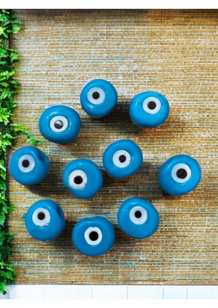 10 Adet Mavi Danagöz Cam Delikli Nazar Boncuğu. El Yapımı. Ebat 1,5 cm ~ 2,5 cm Arası.
