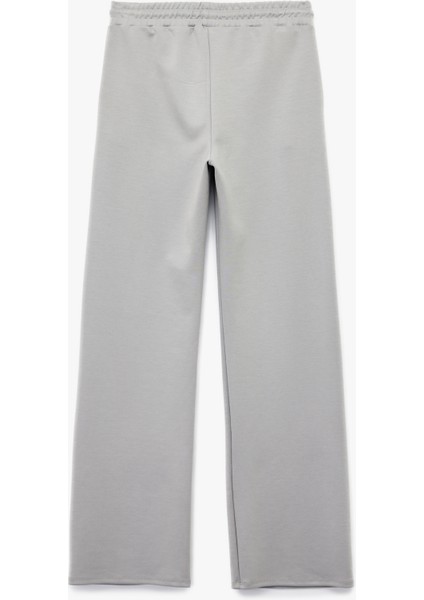 Yüksek Bel Cep Detaylı Beli Bağcıklı Modal Karışımlı Geniş Paça Eşofman Altı fiyatları