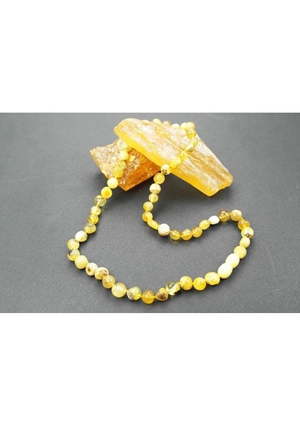 Fosilli Doğal Kesim Damla Kehribar Yetişkin Kolye fiyatları