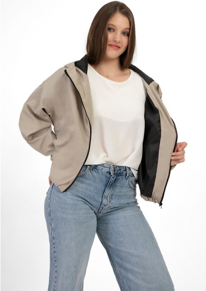 Kadın Kapüşonlu Su ve Rüzgar Geçirmez Cepli Astarlı Oversize Yağmurluk indirimleri