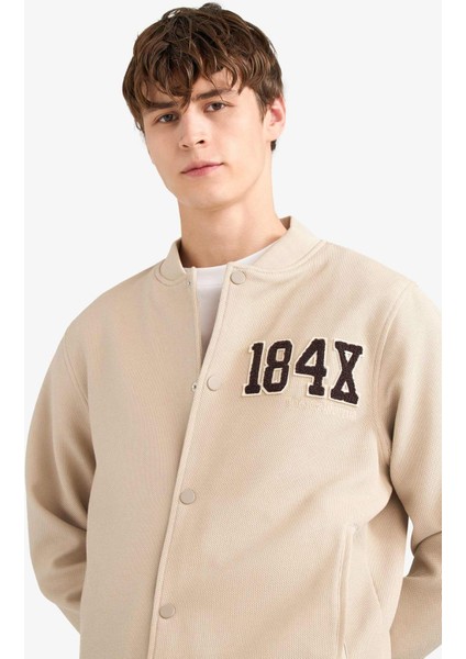 Regular Fit Bomber Kolej Yaka Nakış Detaylı İç Cepli Çıtçıtlı Mont F5096AX25AU fırsatları