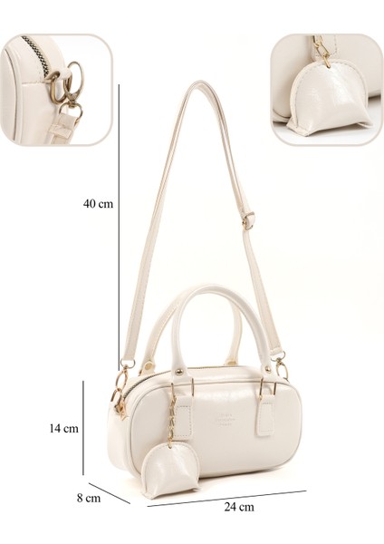 Kırışık Dokulu Krem SHK207 Suni Deri Charm Detaylı Fermuarlı Ayarlanabilir Askılı El, Kol ve Omuz Çantası U:14 E:24 G:8 cm modelleri