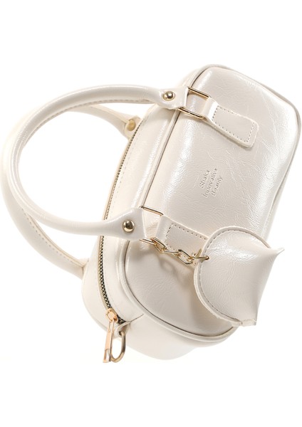 Kırışık Dokulu Krem SHK207 Suni Deri Charm Detaylı Fermuarlı Ayarlanabilir Askılı El, Kol ve Omuz Çantası U:14 E:24 G:8 cm indirimleri