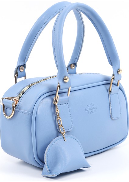 Mavi SHK207 Suni Deri Charm Detaylı Fermuarlı ,askılı El, Kol ve Omuz Çantası fiyatları