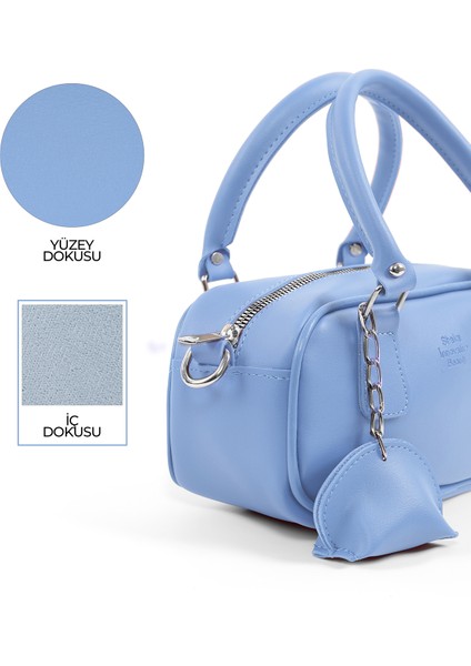 Mavi SHK207 Suni Deri Charm Detaylı Fermuarlı ,askılı El, Kol ve Omuz Çantası indirimleri