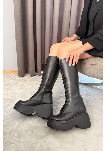 Kadın Bellina Siyah Cilt Bağcık Detaylı Fermuarlı 9 cm Topuklu Platfomlu Çizme indirimleri