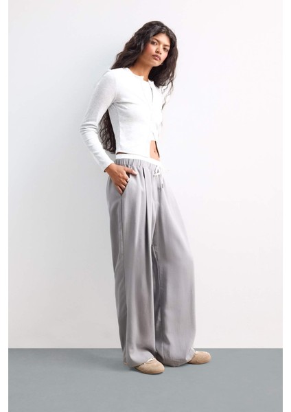 Afra x DeFacto Baggy Fit Çift Cepli Normal Bel Standart Boy Tensel Pantolon F9743AX25HS modelleri