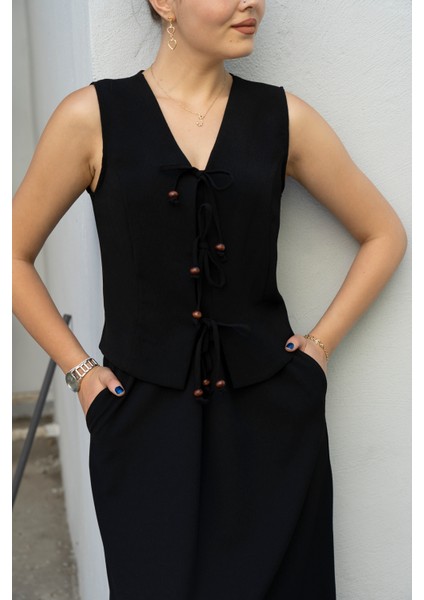 Yelek ve Etek Takım 1244 indirimleri