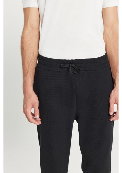 Pamuklu Standart Fit Beli Bağlamalı Desenli Yan Cepli Eşofman Altı fırsatları