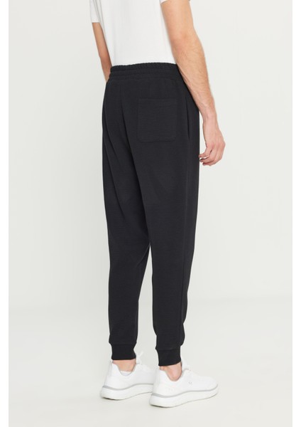 Pamuklu Standart Fit Beli Bağlamalı Desenli Yan Cepli Eşofman Altı indirimleri