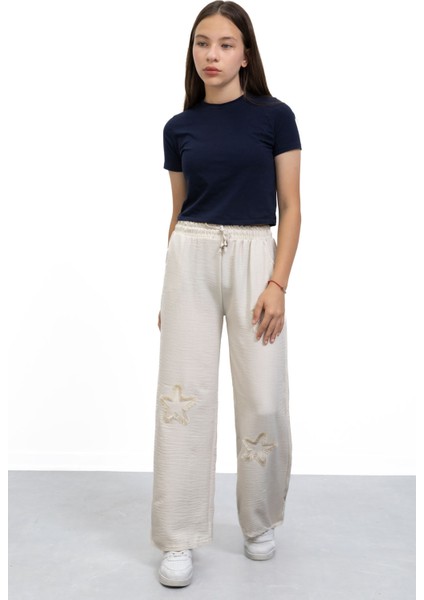 Krem Yıldız Nakışlı Geniş Paça Rahat Kumaş Kız Çocuk Pantolon 21147 fırsatları