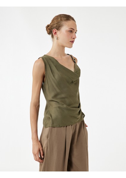 Keten Karışımlı Aksesuar Detaylı Degaje Yaka Kolsuz Bluz fiyatları